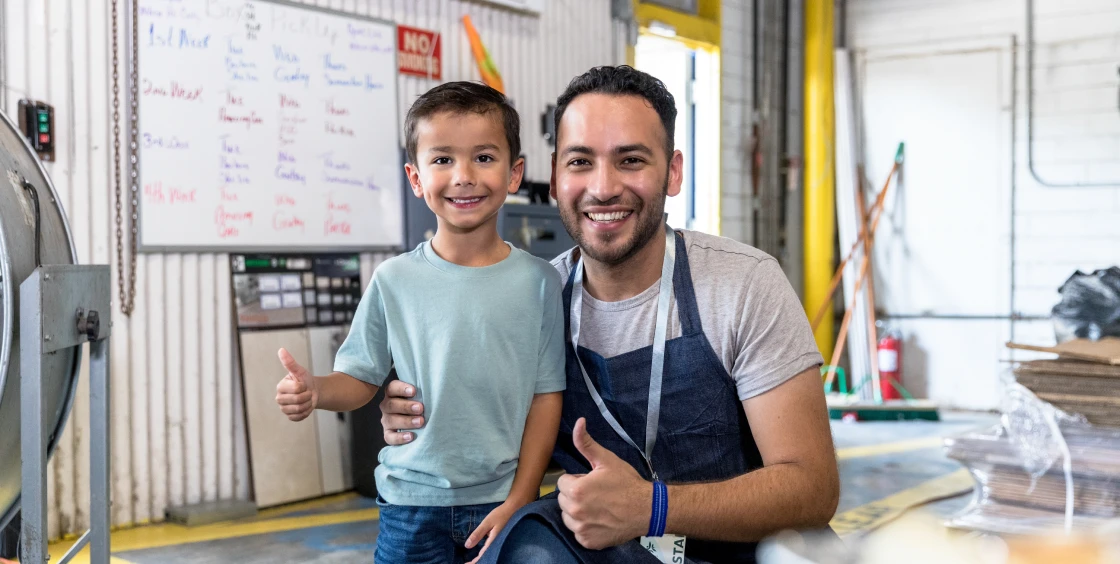 Happy pair posing in industrial space